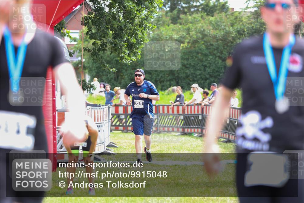 21.06.2026 - 29. Vierlanden-Triathlon Andreas Tolksdorf http://msf.ph/oto/9915048 21.06.2026 11:33:07 Ziel 325, 549 meine-sportfotos.de