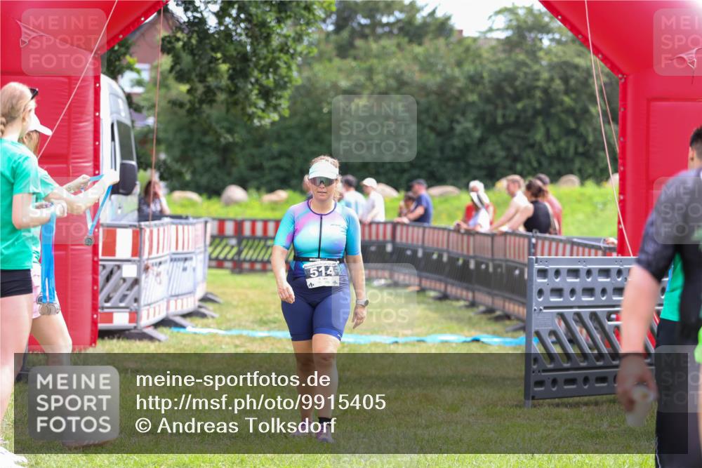21.06.2026 - 29. Vierlanden-Triathlon Andreas Tolksdorf http://msf.ph/oto/9915405 21.06.2026 11:40:56 Ziel  meine-sportfotos.de