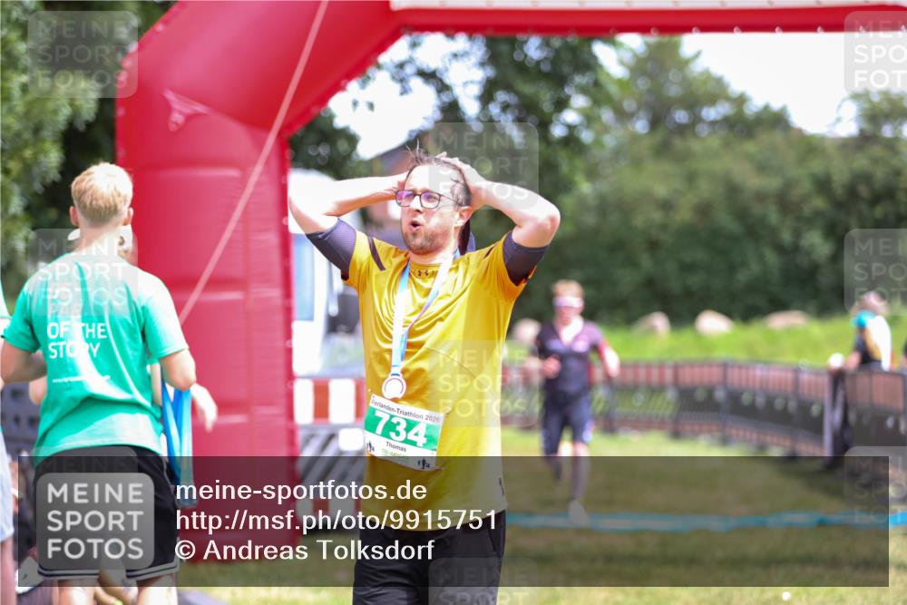 21.06.2026 - 29. Vierlanden-Triathlon Andreas Tolksdorf http://msf.ph/oto/9915751 21.06.2026 14:03:59 Ziel 1078 meine-sportfotos.de