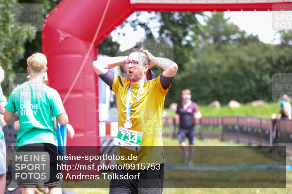 21.06.2026 - 29. Vierlanden-Triathlon Andreas Tolksdorf http://msf.ph/oto/9915753 21.06.2026 14:03:59 Ziel 1078 meine-sportfotos.de