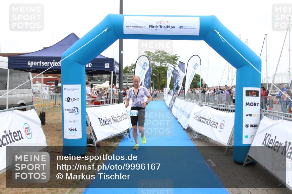 16.08.2026 - KN Förde Triathlon 2026 Markus Tischler http://msf.ph/oto/9996167 16.08.2026 11:54:58 Ziel 302, 302 meine-sportfotos.de