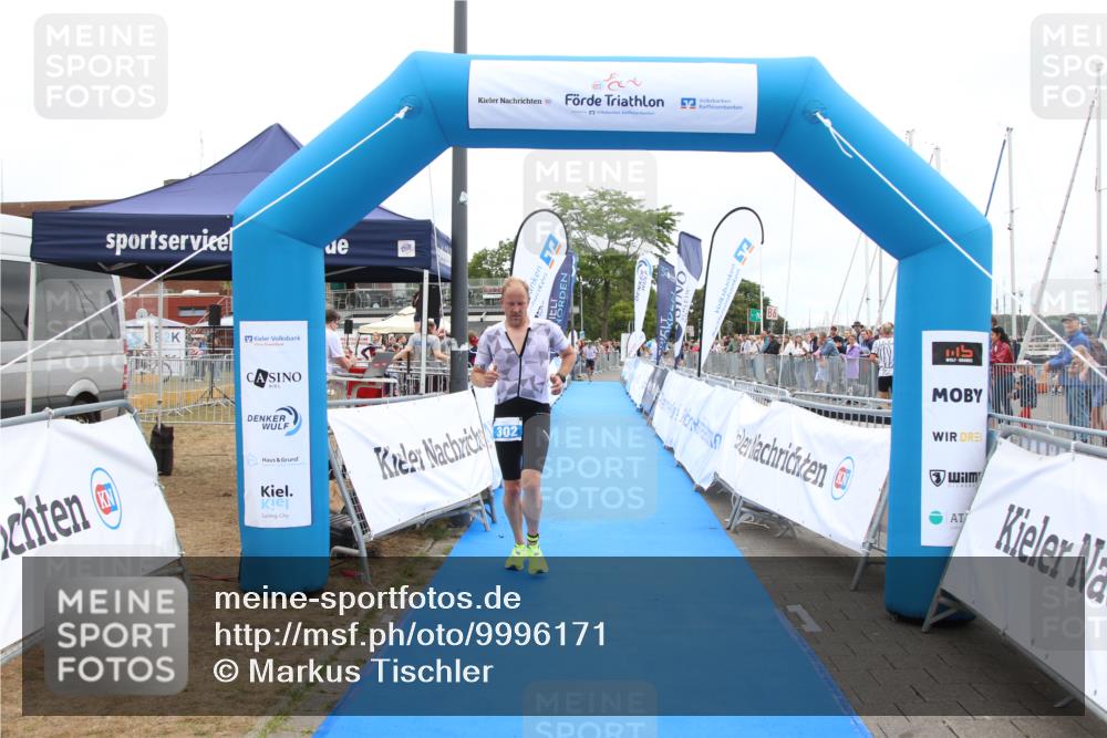 16.08.2026 - KN Förde Triathlon 2026 Markus Tischler http://msf.ph/oto/9996171 16.08.2026 11:54:58 Ziel 302, 302 meine-sportfotos.de