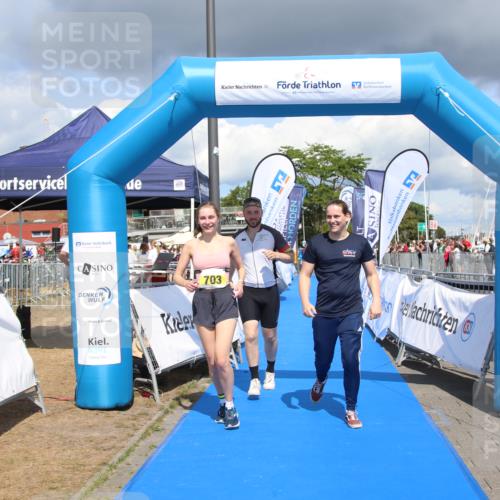 16.08.2026 - KN Förde Triathlon 2026 Markus Tischler http://msf.ph/oto/10002478 16.08.2026 14:01:51 Ziel 703, 703 meine-sportfotos.de