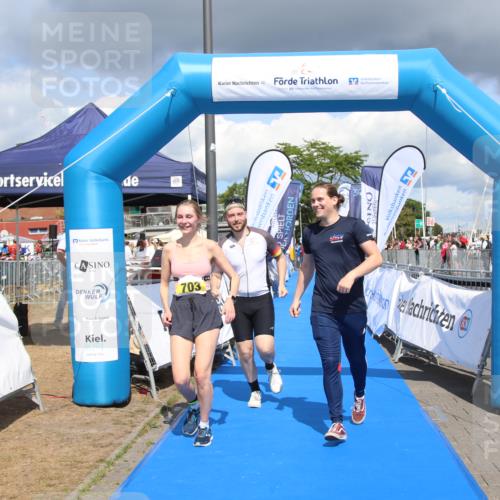16.08.2026 - KN Förde Triathlon 2026 Markus Tischler http://msf.ph/oto/10002481 16.08.2026 14:01:51 Ziel 703, 703 meine-sportfotos.de