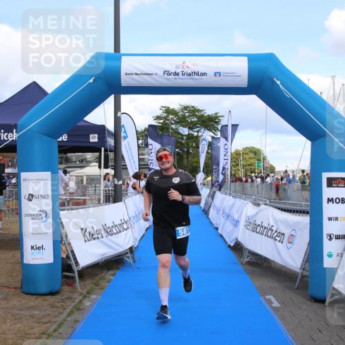 16.08.2026 - KN Förde Triathlon 2026 Markus Tischler http://msf.ph/oto/10002739 16.08.2026 14:09:49 Ziel 581, 581 meine-sportfotos.de