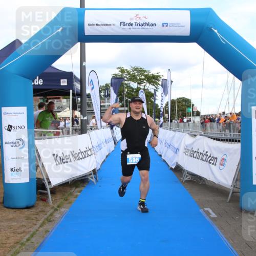 16.08.2026 - KN Förde Triathlon 2026 Markus Tischler http://msf.ph/oto/10002898 16.08.2026 14:20:44 Ziel 596, 596 meine-sportfotos.de