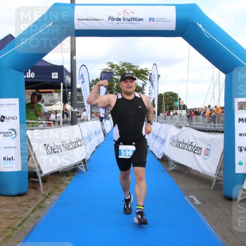 16.08.2026 - KN Förde Triathlon 2026 Markus Tischler http://msf.ph/oto/10002903 16.08.2026 14:20:44 Ziel 596, 596 meine-sportfotos.de