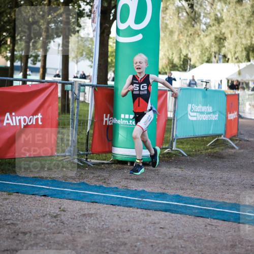 06.09.2026 - 20. Norderstedt Triathlon H.Heesch http://msf.ph/oto/10197430 06.09.2026 09:10:57 Ziel 31, 32, 34, 35, 48 meine-sportfotos.de