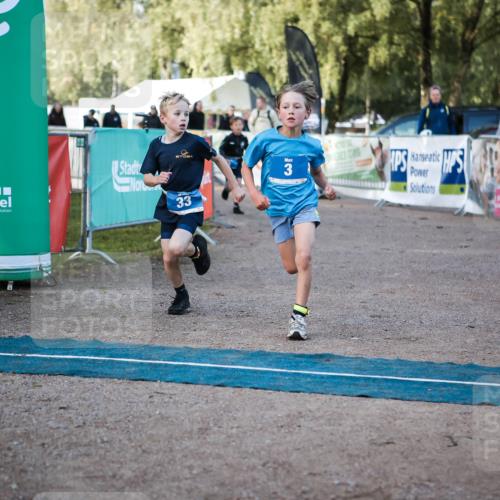 06.09.2026 - 20. Norderstedt Triathlon H.Heesch http://msf.ph/oto/10197494 06.09.2026 09:11:11 Ziel 1, 3, 8, 23, 33 meine-sportfotos.de