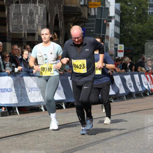 13.09.2026 - 21. swb-Marathon Bremen Strokosch-Dieckow http://msf.ph/oto/10295065 13.09.2026 11:22:32 Ziel 11698, 12157, 11574 meine-sportfotos.de