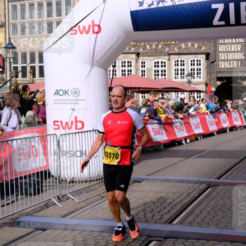 13.09.2026 - 21. swb-Marathon Bremen Tim E. http://msf.ph/oto/10299544 13.09.2026 10:38:59 Ziel 10441, 11127, 12370, 13539 meine-sportfotos.de