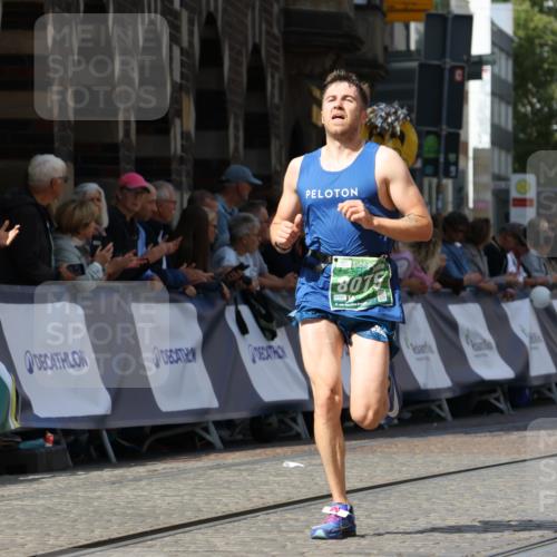 13.09.2026 - 21. swb-Marathon Bremen Strokosch-Dieckow http://msf.ph/oto/10300867 13.09.2026 12:50:34 Ziel 520, 4232, 7692, 668 meine-sportfotos.de