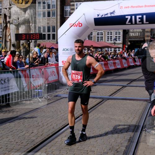 13.09.2026 - 21. swb-Marathon Bremen Tim E. http://msf.ph/oto/10353469 13.09.2026 12:42:27 Ziel  meine-sportfotos.de