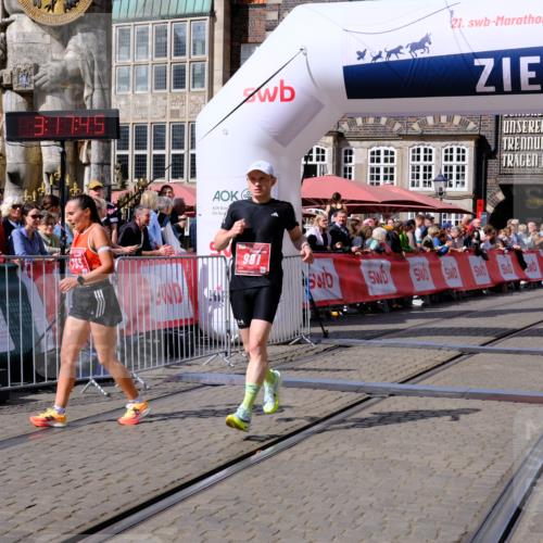 13.09.2026 - 21. swb-Marathon Bremen Tim E. http://msf.ph/oto/10355912 13.09.2026 12:48:34 Ziel  meine-sportfotos.de