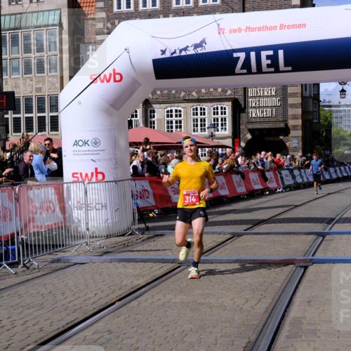 13.09.2026 - 21. swb-Marathon Bremen Tim E. http://msf.ph/oto/10356164 13.09.2026 12:49:33 Ziel  meine-sportfotos.de