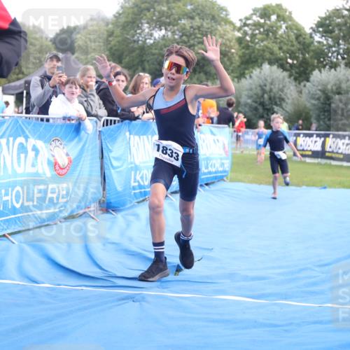25.08.2024 - Elbe Triathlon Hamburg H.Heesch http://msf.ph/oto/6883348 25.08.2024 12:59:21 Ziel 1741, 1843, 1853 meine-sportfotos.de