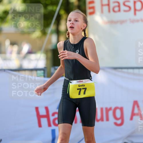 01.09.2024 - 17. Tribühne Triathlon Michael Strokosch http://msf.ph/oto/6896906 01.09.2024 09:50:20 Ziel 77, 104, 113 meine-sportfotos.de