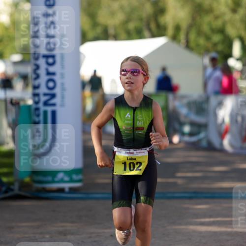 01.09.2024 - 17. Tribühne Triathlon Michael Strokosch http://msf.ph/oto/6897780 01.09.2024 09:54:22 Ziel 102 meine-sportfotos.de