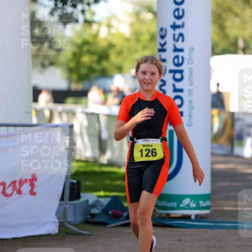01.09.2024 - 17. Tribühne Triathlon Michael Strokosch http://msf.ph/oto/6897906 01.09.2024 09:55:06 Ziel 126 meine-sportfotos.de