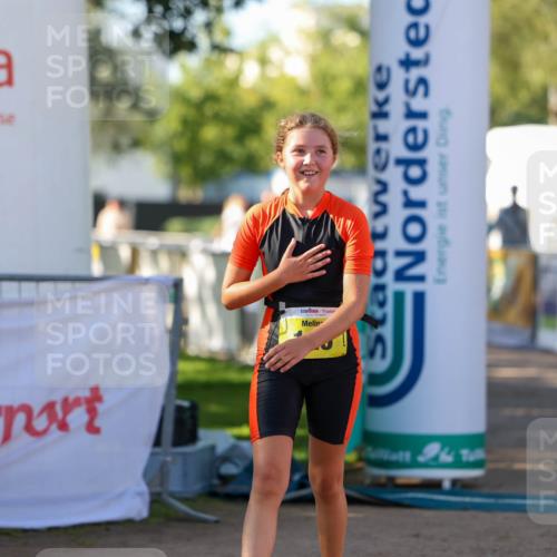 01.09.2024 - 17. Tribühne Triathlon Michael Strokosch http://msf.ph/oto/6897911 01.09.2024 09:55:06 Ziel 126 meine-sportfotos.de