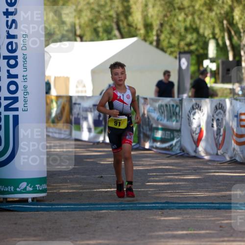 01.09.2024 - 17. Tribühne Triathlon Michael Strokosch http://msf.ph/oto/6897986 01.09.2024 09:55:20 Ziel 91 meine-sportfotos.de