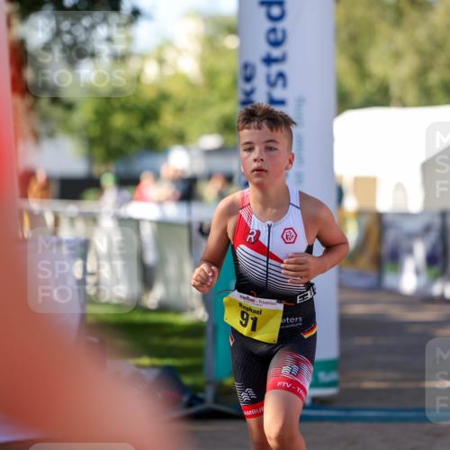01.09.2024 - 17. Tribühne Triathlon Michael Strokosch http://msf.ph/oto/6898041 01.09.2024 09:55:23 Ziel 91 meine-sportfotos.de