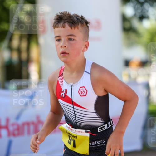 01.09.2024 - 17. Tribühne Triathlon Michael Strokosch http://msf.ph/oto/6898047 01.09.2024 09:55:24 Ziel 91 meine-sportfotos.de