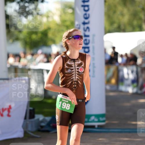 01.09.2024 - 17. Tribühne Triathlon Michael Strokosch http://msf.ph/oto/6902987 01.09.2024 11:02:17 Ziel 198 meine-sportfotos.de