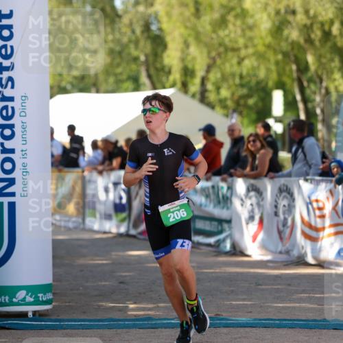 01.09.2024 - 17. Tribühne Triathlon Michael Strokosch http://msf.ph/oto/6903106 01.09.2024 11:03:08 Ziel 206, 265 meine-sportfotos.de
