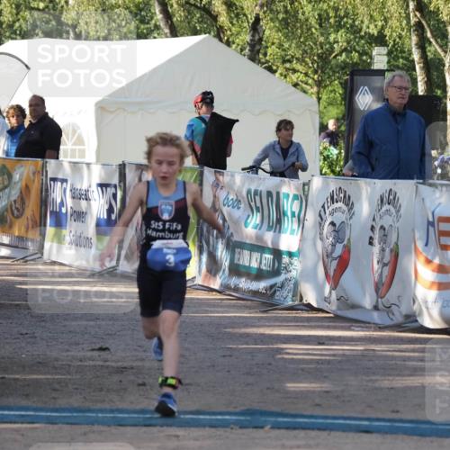01.09.2024 - 17. Tribühne Triathlon Michael Strokosch http://msf.ph/oto/6941683 01.09.2024 09:17:33 Ziel 3 meine-sportfotos.de