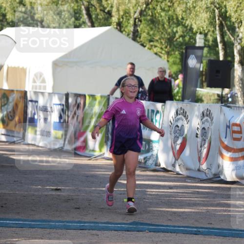 01.09.2024 - 17. Tribühne Triathlon Michael Strokosch http://msf.ph/oto/6941761 01.09.2024 09:21:08 Ziel 49 meine-sportfotos.de
