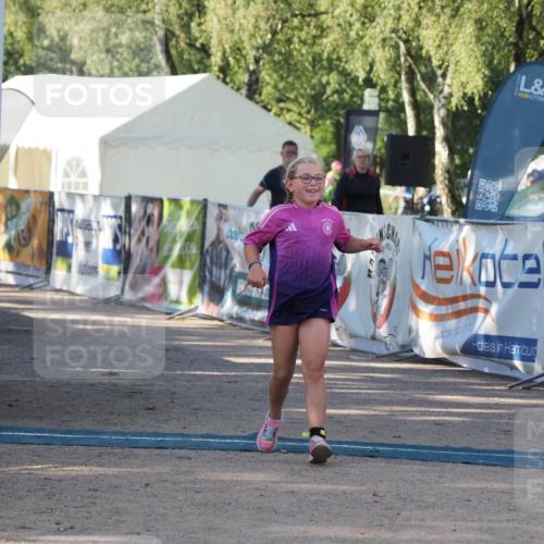 01.09.2024 - 17. Tribühne Triathlon Michael Strokosch http://msf.ph/oto/6941770 01.09.2024 09:21:09 Ziel 49 meine-sportfotos.de