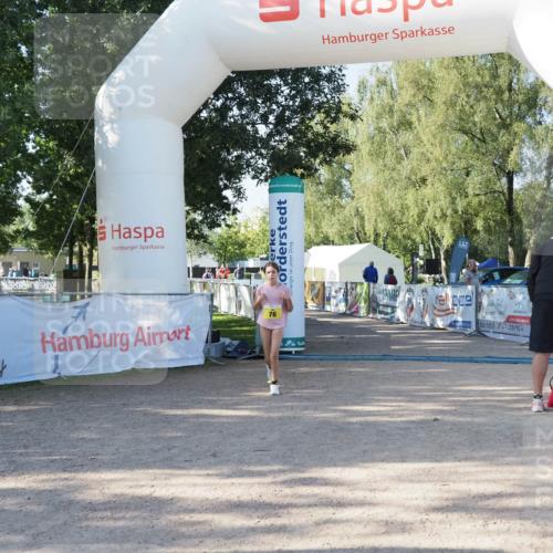 01.09.2024 - 17. Tribühne Triathlon Michael Strokosch http://msf.ph/oto/6941786 01.09.2024 09:24:12 Ziel 76 meine-sportfotos.de