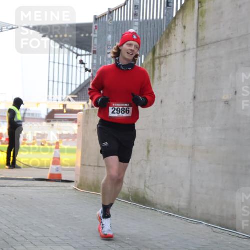 08.12.2024 - St. Pauli X-Mass-Run No. 14 H.Heesch http://msf.ph/oto/7486994 08.12.2024 09:48:18 Ziel 2986, 2986 meine-sportfotos.de