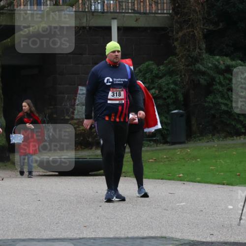 08.12.2024 - St. Pauli X-Mass-Run No. 14 Strokosch-Dieckow http://msf.ph/oto/7507889 08.12.2024 09:48:21 Laufen 318, 318, 1911 meine-sportfotos.de