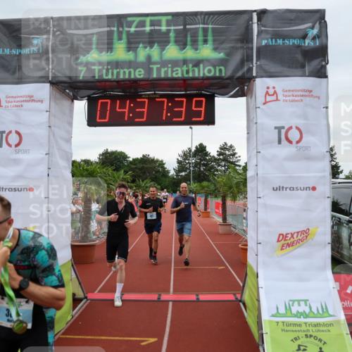 15.06.2025 - 7 Türme Triathlon Michael Strokosch http://msf.ph/oto/8001736 15.06.2025 14:37:39 Ziel 386, 585, 607 meine-sportfotos.de