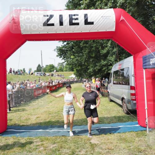 21.06.2025 - 27. Vierlanden-Triathlon MichiJ http://msf.ph/oto/8022969 15.06.2026 11:38:41 Ziel 618 meine-sportfotos.de