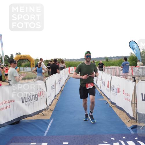 22.06.2025 - Viking Triathlon MichiJ http://msf.ph/oto/8111525 22.06.2025 16:23:19 Ziel 634 meine-sportfotos.de