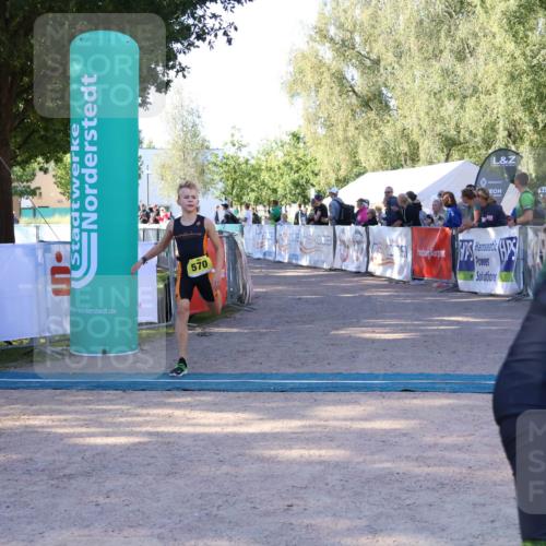 07.09.2025 - 19. Norderstedt Triathlon Zöllner http://msf.ph/oto/8770604 07.09.2025 09:46:57 Ziel 570, 633 meine-sportfotos.de