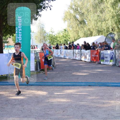 07.09.2025 - 19. Norderstedt Triathlon Zöllner http://msf.ph/oto/8770910 07.09.2025 09:48:34 Ziel 598, 603, 623, 625 meine-sportfotos.de