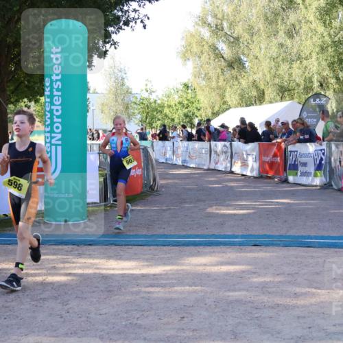 07.09.2025 - 19. Norderstedt Triathlon Zöllner http://msf.ph/oto/8770912 07.09.2025 09:48:34 Ziel 598, 603, 623, 625 meine-sportfotos.de