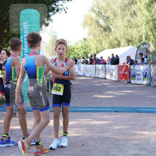 07.09.2025 - 19. Norderstedt Triathlon Zöllner http://msf.ph/oto/8771000 07.09.2025 09:48:59 Ziel 592, 629 meine-sportfotos.de