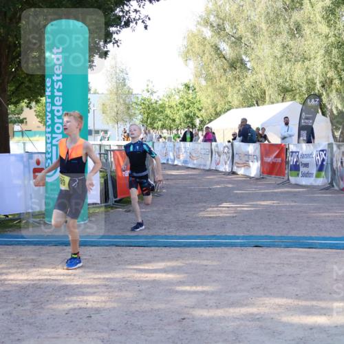 07.09.2025 - 19. Norderstedt Triathlon Zöllner http://msf.ph/oto/8771689 07.09.2025 09:53:46 Ziel 589, 610 meine-sportfotos.de