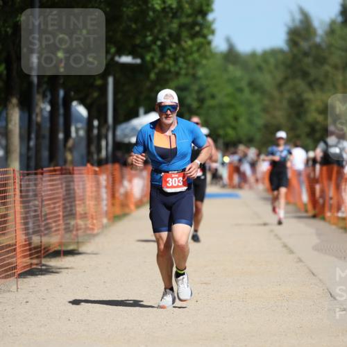 07.09.2025 - 19. Norderstedt Triathlon Michael Strokosch http://msf.ph/oto/8800516 07.09.2025 12:30:33 Laufen 303, 703, 1294 meine-sportfotos.de