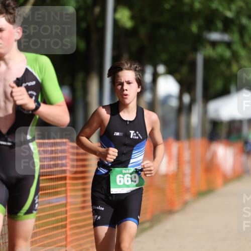 07.09.2025 - 19. Norderstedt Triathlon Michael Strokosch http://msf.ph/oto/8800675 07.09.2025 10:57:25 Laufen 655, 669 meine-sportfotos.de