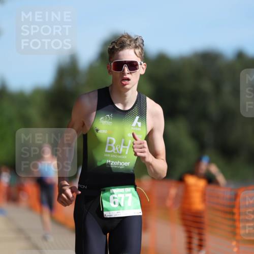 07.09.2025 - 19. Norderstedt Triathlon Michael Strokosch http://msf.ph/oto/8809961 07.09.2025 10:39:36 Laufen 654, 677 meine-sportfotos.de
