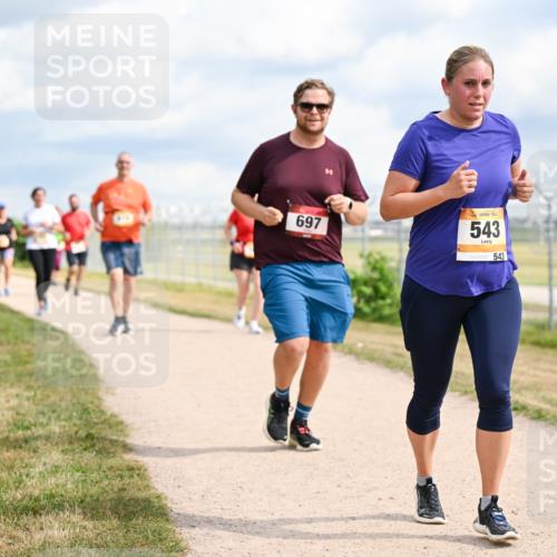 14.09.2025 - Airport Race Dr. Thomas Lammeyer http://msf.ph/oto/8883654 14.09.2025 12:37:50 Laufen 697, 543, 543 meine-sportfotos.de