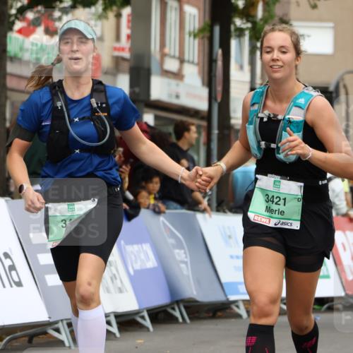 21.09.2025 - PSD Bank Halbmarathon Strokosch-Dieckow http://msf.ph/oto/8948781 21.09.2025 12:47:09 Ziel 3420, 3421 meine-sportfotos.de