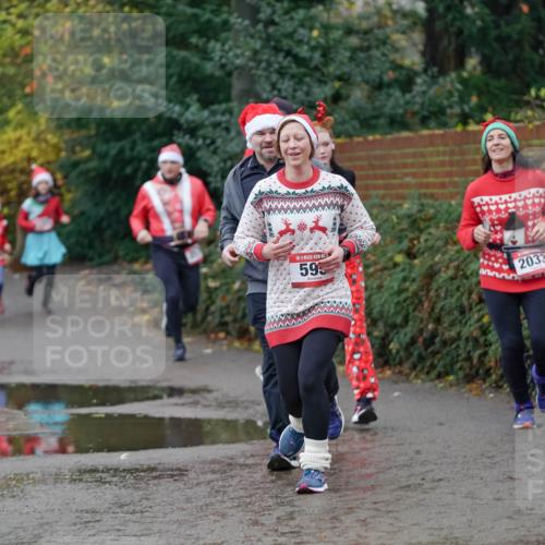 07.12.2025 - St. Pauli X-Mass-Run No. 15 Michael Burmester http://msf.ph/oto/9404301 07.12.2025 11:03:24 Laufen 595, 2033 meine-sportfotos.de