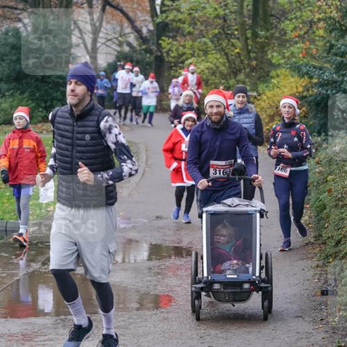07.12.2025 - St. Pauli X-Mass-Run No. 15 Michael Burmester http://msf.ph/oto/9405537 07.12.2025 11:09:14 Laufen 3169, 316, 166 meine-sportfotos.de